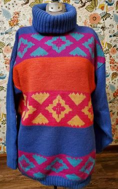 "Classic 80s style! This vintage wool pullover sweater from Merona has a great 1980s look. Vivid blue, yellow, pink, purple and orange geometric stripes, loose and roomy shape, thick turtleneck. Perfect with jeans or leggings. Size M/Medium. Pit to pit 23\", sleeves 31\", length 29\"." Colorful Turtleneck, 80s Fashion For Women 1980s Outfits, 1980s Looks, Thick Turtleneck, 1980s Outfits, 80s Womens Fashion, 1980s Fashion Trends, Retro Clothes, 80s Fashion Trends