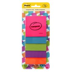 four different colored sticky notes in a package