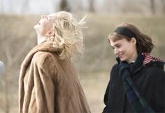 two young women standing next to each other