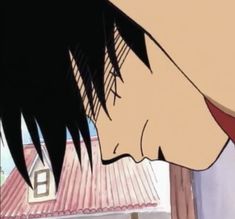 an anime character with black hair looking down at the ground and his face is close up