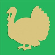 a turkey cut out on a green background