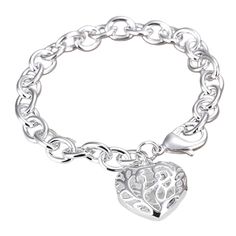 Every girl needs a charm bracelet. This bright silver charm bracelet has a fascinating hollow, puffed heart charm with intricate scroll design. Clip on more of your favorite charms for a one of a kind look. Fits up to an 8 inch wrist and is adjustable along the chain. Heavy lobster claw clasp for secure closure. Complete the look with a matching Puffed Heart Charm Necklace For Women Occasion: Birthday, Holidays, Valentine's Day, Mother's Day Materials: 925 Sterling Silver over Alloy Size: Heart White Heart-shaped Metal Charm Bracelet, Elegant Silver Heart Charm, Elegant Engraved Heart Charm Bracelet, Elegant Silver Heart-shaped Charms, Elegant Sterling Silver Heart Charm Bracelet, White Metal Heart Bracelet, White Metal Heart-shaped Bracelet, Silver Metal Heart Bracelet As A Gift, Silver Metal Heart Bracelet Gift