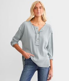 BKE Raw Edge Henley - Blue X-Small, Women's Graymist Ribbed knit henley Exposed seam details Bust measures 42 on size small Body length 24 on size small. 95% Cotton 5% Spandex. Machine wash cold. Do not bleach. Line dry. Iron low. Do not dry clean. Wash and dry with like colors.  . Measurements: Bust -Fullest part of bust with arms at sides. Waist -Circumference of natural waist: above belly button below rib cage. Hips -Standing with feet together fullest part of hips. WOMEN'S TOP SIZE CONVERSIO Casual Relaxed Fit Henley For Spring, Casual Spring Henley For Everyday Wear, Spring Casual Henley With Button Closure, Casual Henley With Buttons For Loungewear, Women's Henley, Waist Circumference, Women Shirts Blouse, Rib Cage, Shirts Blouses