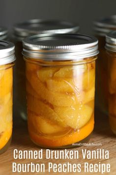 canned drukken vanilla bourbon peaches recipe in mason jars with text overlay