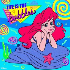 the little mermaid with pink hair and blue dress is sitting on top of an ocean floor