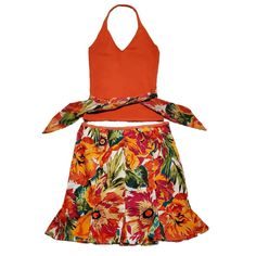 Bandolino Tropical Floral Skirt Set New With Tags Stretchy Coral Halter Top With Scarf Tie That Matches Skirt Size Ps Approx. Measurements: Pit To Pit Flat 14", Length 19" Material - 53% Silk, 28% Nylon, 19% Cotton Floral Mini Skirt With Ruffle Size 10p Approx. Measurements: Waist 30", Length 19" Material - 97% Cotton, 3% Spandex Side Zip Orange Floral Print Skirt For Day Out, Orange Skirt For Summer Vacation, Orange Summer Skirt For Beach, Summer Orange Skirt For Day Out, Orange Summer Skirt For Day Out, Orange Summer Skirt, Summer Orange Skirt For Vacation, Orange Cotton Skirt For Day Out, Cotton Orange Skirt For Day Out