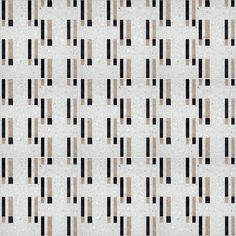 a white and black tiled wall with vertical lines in the center, as well as horizontal stripes on each side