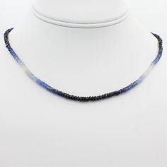 Description Whether you're looking for a pop of color for your everyday look, or you've been on the hunt for the perfect "something blue", our Beauty in Blue Choker is just what you've been searching for.Featuring over 40 carats of ombre blue and white faceted sapphire beads, this adjustable choker is a true stunner from all angles, with the heavily faceted beads catching the light at every angle. Item Details Want something a bit longer? Let us know. We can customize an ombre necklace for you i Everyday Blue Sapphire Jewelry, Blue Faceted Everyday Necklace, Everyday Blue Faceted Necklace, Sapphire Choker, Ombre Necklace, Blue Choker, Sapphire Beads, Creating Jewelry, Blue Ombre