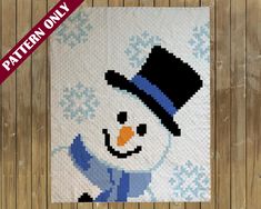 a snowman with a hat and scarf is shown on a wooden background, it has a pattern only