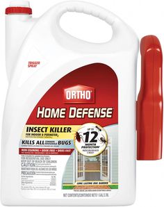 a gallon of insect killer next to a red plastic bottle