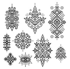 an assortment of hand drawn snowflakes in black and white, each with different designs