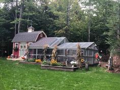 a house in the woods with lots of plants growing out of it's roof