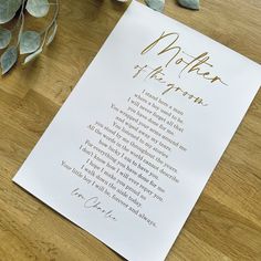 a mother's poem on a piece of paper next to flowers