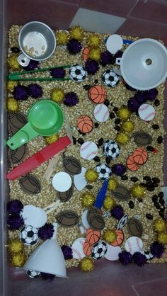 an assortment of sports themed items on a table