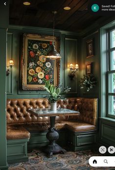 a couch and table in a room with green walls