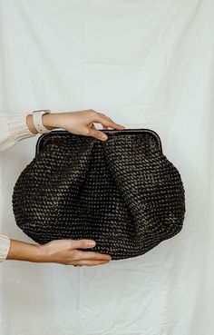 This lightweight exotic oversized straw bag is perfect for summer and is perfect for any occasion. A black oversized clutch with plenty of space inside is the perfect accessory for your summer wardrobe. Cloud bag is available to order Size: XL: Height  - 9.05 inches (23 cm) Width of the bag itself is  - 17.71 inches (45 cm) Depth - 7.87 inches (20 cm) * Please note that depending on the type and settings of your screen, the color of the product may differ slightly from the photo. Even the most p Chic Black Straw Bag With Woven Leather, Elegant Black Woven Leather Straw Bag, Woven Straw Tote Bag For Evening, Evening Woven Straw Tote Bag, Black Woven Leather Clutch Bag, Black Evening Straw Bag, Elegant Black Straw Bag, Evening Straw Clutch Bag With Braided Handles, Black Tote Straw Bag For Evening