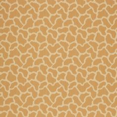 an orange and white pattern on fabric