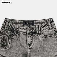 SMFK Compass Tarpan Rock Low-Waist Denim Shorts Dark Gray - Design: Low-waist denim shorts with the iconic SMFK Mustang design. An aged and distressed look is achieved through multiple stone washes to create a unique snowflake denim texture. Signature SMFK V-notch detail for a stylish enhancement. It comes with a mini outdoor enhancement accessory pack for added functionality. Size (in cm) Waist Hip Length XS 67 81 21.5 S 70 84 22 M 73 87 22.5 L 76 90 23 Composition: 69.4% Cotton, 22% Polyester, 8% Viscose, 0.6% Spandex Punk Denim Jean Shorts For Streetwear, Punk High Waist Denim Jean Shorts, Punk High-waisted Denim Jean Shorts, Punk Style High Waist Denim Jean Shorts, Punk Denim Shorts For Streetwear, Denim Punk Style Shorts For Streetwear, Y2k High Waist Jean Shorts For Streetwear, Y2k High-waist Jean Shorts For Streetwear, Punk High Waist Denim Shorts