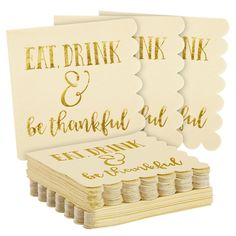 two cards with gold foil on them and the words eat drink and be grateful in cursive writing