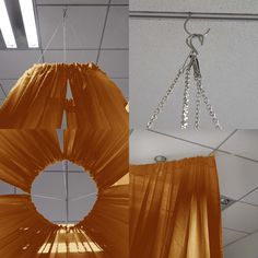 an orange curtain is hanging from the ceiling