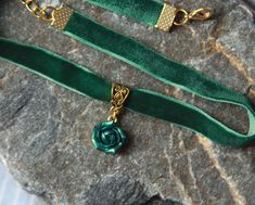 "Green velvet ribbon choker with sculpted sparkly rose. Rose material is polymer clay with special cover. Each petal of flower made by hand Dia flower about 15 mm/ 0.55 \" Length of choker is adjustable: 10-12 inches/ 25,4 - 30,5 cm 11-13 inches/ 28-33 cm 12-14 inches/ 30.5- 35.5 cm 13-15 inches/ 33-38 cm 14-16 inches/ 35.5 cm-40.6 cm 15-17 inches/ 38,1 cm- 43,2 cm 16-18 inches/ 40,6 cm- 45,7 cm 17-19 inches/ 43,2 cm- 48,2 cm Width of ribbon 10 mm / 0.4 inch If you need other length of necklace Rose Design Choker As Gift, Elegant Rose Design Choker As Gift, Dark Green Necklace, Green Velvet Ribbon, Green Choker, Rose Choker, Blue Choker, Ribbon Choker, Cute Beanies