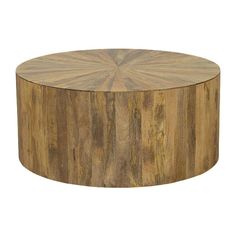 a round wooden table sitting on top of a white floor