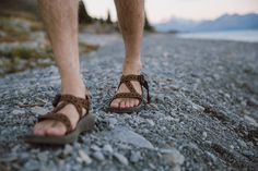 Step by step on the beaches of NZ. #ChacoNation Ergonomic Sandals With Arch Support For Hiking, Sandal Gunung, Shoe Photography, Beach Shoe, Dad Sandals, Photography Men, Classic Sandals, Teva Sandals, Shoes Photography