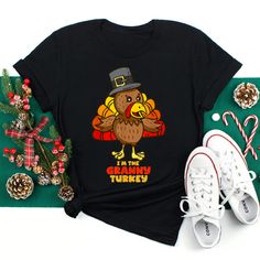 Buy I’m The Granny Turkey Matching Family Thanksgiving 2022 Shirt at Fantasywears. Hight quality products with perfect design is available in a spectrum of colors and sizes, and many different types of shirts! Unisex T-Shirt – 100% Cotton (fiber content may vary for different colors) – Medium fabric (5.3 oz/yd² (180 g/m²)) – Classic fit – Tear away the label – Runs true to size Women T-Shirt – 100% combed ringspun cotton (fiber content may vary for different colors) – Light fabric (4.3 oz/ Turkey Lover, Gobble Til You Wobble, Happy Turkey Day, Thankful Shirt, Thanksgiving Tee, Turkey Shirts, Family Thanksgiving, Kindness Shirts, Thanksgiving Shirts