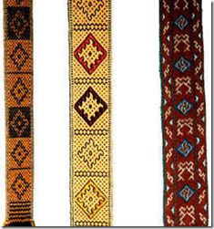 three different types of beaded belts with designs on the sides, one red and one yellow