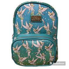 Storybook Disney Tinker Bell Ombre Mini Backpack You're Going To Love This Disney Mini Backpack Featuring Disney Tinker Bell! Stylish And Sleek Mini Backpack Made From Premium Vegan Leather. It Measures 12" X 6" 9.5" Inches And Features Space To Carry All Your Favorite Things Including Phone, Wallet, Keys, Etc. The Gorgeous Artwork Is Applied Using The Latest Printing Technology So It Will Hold Up Well Over Time. Officially Licensed Product Dimensions: Width 9.5" Depth 6" (7" With Pocket) Height Disney Backpack With Zipper Closure For Daily Use, Disney Backpack With Case For School, Disney Backpack For School With Case Included, Daily Use Disney Backpack, Blue Disney Backpack With Zipper Closure, Disney Mini Backpack, Disney World Backpack, Backpack With Pins, Loungefly Purse