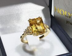 Don't miss this opportunity to own this beautiful gemstone ring crafted in 14k gold filled => Gemstone Type - Citrine, Clear Quartz => Gemstone Cut - Faceted => Gemstone Size - 8*10 mm, 2 mm => Total Number of Gemstones - 7 => Metal Type - 14k Gold Filled (Tarnish Resistant And Nickel Free) - also available in 925 sterling silver * Please contact me for pricing on a sizes larger than 11 * ~ Feel free to ask me about custom made designs. ❏ Replacements and custom orders : ✪ 925 ste Yellow Rectangular Stone Ring For Gift, Yellow Rectangular Stone Ring Gift, Rectangular Stone Yellow Ring Gift, Yellow Gemstone Ring With Rectangular Stone, Yellow Rings With Gemstone And Rectangular Stone, Yellow Rectangular Gemstone Rings, Rectangular Topaz Promise Ring With Accent Stones, Rectangular Citrine Gemstone Ring, Rectangular Citrine Wedding Rings