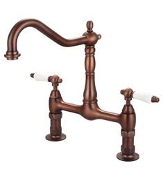 an antique style kitchen faucet with two handles