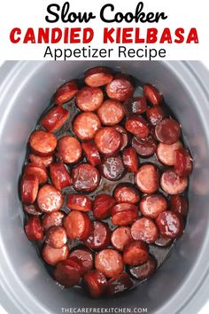 a slow cooker filled with candied kielbasa and text overlay reads slow cooker appetizer recipe