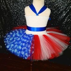 Featured!!! 'Star Spangled' Youth Lined Tutu Dress. This Dress Is Sure To Turn Eyes! It Is Designed With A Stretchy, White Crochet Elastic Bodice, Has A V-Neckline Made Of Bright Blue Ribbon, And Coordinating Blue Ribbon Around The Waist. The Skirt Of The Dress Features Two Full Layers Of Tulle, Intricately Designed Shiny Red And White Tulle To Reflect The 13 Red & White Stripes Of The Flag, And A Combination Of Shiny Blue Tulle And Shiny Blue Tulle With White Shimmery Stars, Altogether, Represe Tutu Couture, Red White Stripes, Kids Tutu, Tutu Skirts, Blue Tulle, Summer Lace, Girl Princess Dress, Bow Detail Dress, White Tulle