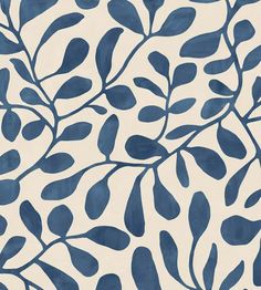 a blue and white wallpaper with leaves on it