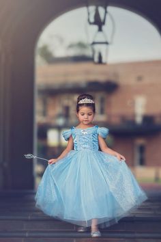 She will be the fairest in all the land in this darling blue princess dress. Full of details and whimsy, this is not your average costume. Incredible quality and a perfect keepsake for years to come. Don't forget to add our tiara and our wand for just the right accessories for the princess! These are soft and never scratchy, we understand tactile sensitivity and always design using the softest materials, then we fully line the dresses with soft cotton. NO GLITTER is ever used on ANY of our produ Princess Dress Costume, Blue Princess Dress, Pink Princess Dress, Girls Fall Dresses, Princess Dress Up, Girls Dress Up, Glamorous Dresses, Princess Wedding Dresses, Dress Costume