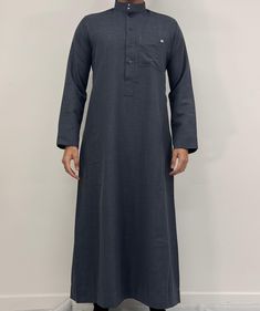 Introducing our Men's Winter Saudi Thobe, the perfect addition to your Islamic clothing collection. Made from a high-quality Winter mix fibre fabric, this thobe is not only easy to iron but also incredibly soft and comfortable to wear. The meticulous stitching make this thobe a truly stand-out piece. Available in a wide range of colours and sizes, you're sure to find the perfect fit for your personal style. And for the younger members of your family, we also offer this Saudi thobe in boys sizes. Neat Clothes, Fibre And Fabric, Islamic Clothing, Everyday Wardrobe, Men Winter, Clothing Items, Special Events, Personal Style, Porter