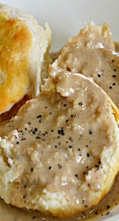 biscuits and gravy in a white bowl