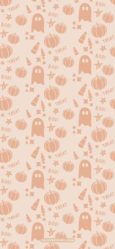 an orange and white wallpaper with pumpkins on it