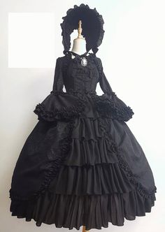 This is a long Gothic Lolita dress with lace overlay and Gothic ball gown style. Made with a sheer fabric for a sexy and glamorous look, this dress is perfect for a Gothic wedding or night out. We offer two length here: Long-48inch Short-38inch ❤️CUSTOM MADE❤️ For custom made, please message us your height, bicep circumstance, bust, lower chest circumference, mid-shoulder to bust point, waist and shoulder width. How to measure? Gothic Ball Gown, Gothic Wedding Dress, Op Dress, Classic Lolita, Fotografi Vintage, Victorian Dolls