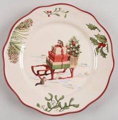 a christmas plate with an image of a man sitting on a sleigh and presents