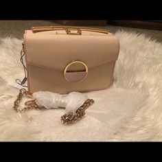 Nice And Small Have 2 Open Side. Chic Flap Bag With Dust Bag For Shopping, Beige Evening Bag For Spring, Elegant Leather Flap Bag As Fashion Accessory, Beige Evening Bags For Spring, Modern Beige Shoulder Bag For Party, Spring Evening Satchel Shoulder Bag, Elegant Leather Satchel For Spring, Chic Beige Clutch Flap Bag, Chic Beige Box Bag For Party