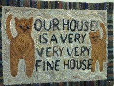 a door mat with cats on it that says our house is very very fine house