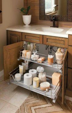 a bathroom sink with two shelves holding toiletries and soaps