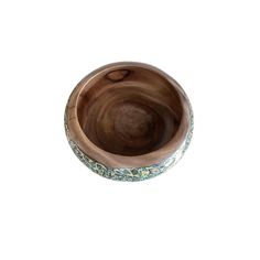 a wooden bowl is shown on a white background