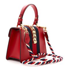 This is an authentic GUCCI Calfskin Mini Sylvie Top Handle Bag in Hibiscus Red. This structured shoulder bag is crafted of smooth red calfskin leather and features a prominent front flap detailed with a central canvas red and navy blue web stripe. A top handle and shoulder strap compliment the polished gold chain buckle lock closure. The top flap opens to a camel brown microfiber lining interior with a flat pocket. Hibiscus Red, Structured Shoulder, Handle Bag, Hibiscus, Gold Chain, Top Handle, Gold Chains, Calf Skin, Camel