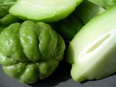 some green vegetables sitting on top of a table