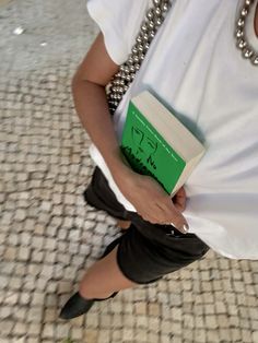 White tee, cut off denim shorts, cowboy boots, beaded silver bag, silver necklace, silver jewellery #lisbon #outfit #ootd #lgbtq #wlw Lisbon Outfit, Shorts Cowboy Boots, Silver Bag, Silver Bags, Casual Summer Outfit, White Tee, Silver Jewellery