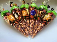 a bunch of halloween candies in cellophane bags