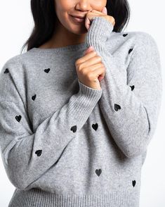 The adorable Sweetheart sweater you're missing! /Embroidered hearts all over /Drop Shoulder with relaxed fit /Model is wearing a Size small - 23" length /100% Cashmere Embroidered Hearts, Boyfriend Sweater, Grey Jumper, Heart Sweatshirt, Heart Sweater, Embroidered Heart, Drop Shoulder, Heather Grey, Fitness Models